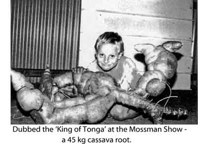 Photo of boy with 45 kg cassava root.